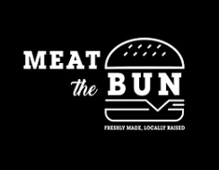 Meat The Bun Edmonton &mdash; Butter Chicken Burger with Indian-spiced butter chicken sauce and fresh toppings on a premium beef patty